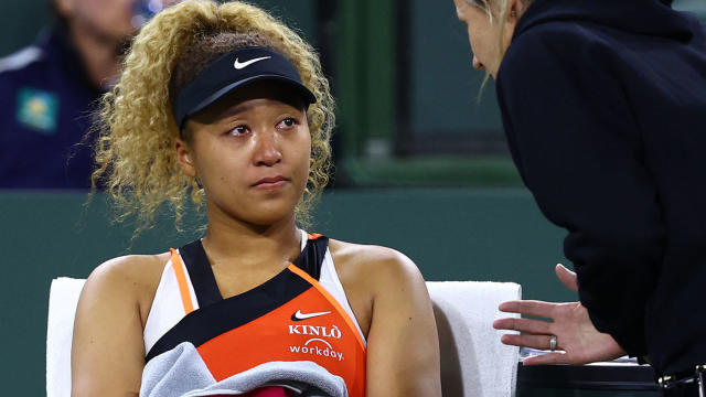 INDIAN WELLS, CALIFORNIA - MARCH 12: Naomi Osaka of Japan speaks with WTA supervisor Clare Wood after play was disrupted by a shout from the crowd during her straight sets defeat against Veronika Kudermetova of Russia in their second round match on Day 6 of the BNP Paribas Open at the Indian Wells Tennis Garden on March 12, 2022 in Indian Wells, California. (Photo by Clive Brunskill/Getty Images)