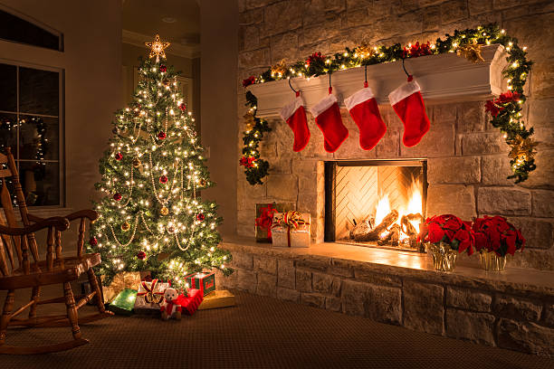 Glowing+Christmas+fireplace+and+living+room%2C+with+tree%2C+and+stockings+hanging+from+mantel+by+fireplace.Waiting+for+Santa.